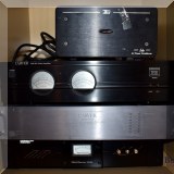 E03. Tice Solo AV power conditioner, Carver TFM-55x power amplifier, Carver magnetic feld power amplifier Model M-15t, and Monster Power home theatre reference power center HTS3500 